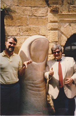 Roger Ebert and Richard Corliss at the Colombe d'Or restaurant in St-Paul-de-Vence, France in the late 1980's. The thumb sculptor is by César Baldaccini.