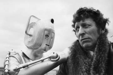 English actor and star of the long running television series, Dr Who, Tom Baker, with one of his arch enemies, the Cybermen.