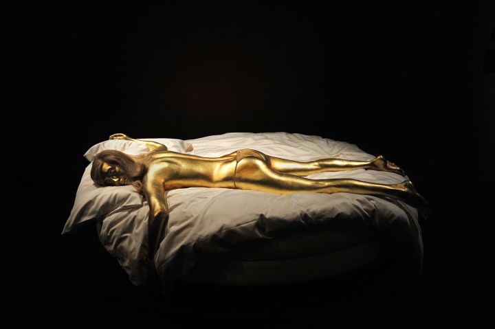 A model of the woman painted gold in the James Bond film 'Goldfinger' 