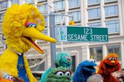 Big Bird (L) and other Sesame Street puppets