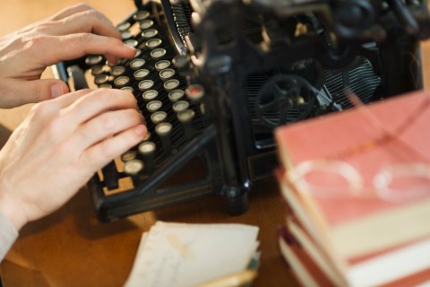 Image: Typing on typewriter