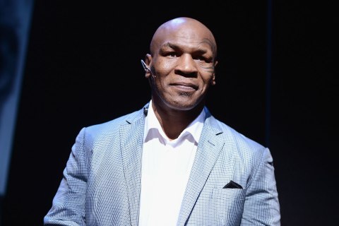 image: Mike Tyson takes part in a curtain call following his "Mike Tyson: Undisputed Truth" Broadway Opening Night at Longacre Theatre in New York City, Aug. 2, 2012.