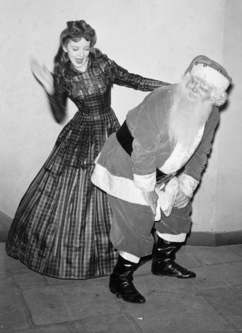 Ida Lupino Giving Santa Birthday Spanking