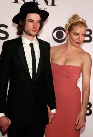 From left: Tom Sturridge and Sienna Miller arrive at The 67th Annual Tony Awards at Radio City Music Hall in New York City, on June 9, 2013.