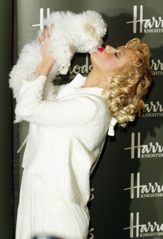 Pop star Christina Aguilera officially opens the  Harrods Summer sale at the Knightsbridge store on June 28, 2004 in London. 