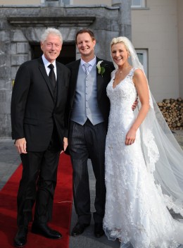 From left: U.S. President Bill Clinton with newlyweds Patrick and Kelly Howard at the Howards' wedding in Cork, Ireland.