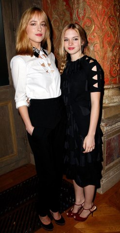 From left: Dakota Johnson and Stella Banderas attend the Viktor&Rolf show as part of Paris Fashion Week Haute-Couture Fall/Winter 2013-2014 in Paris, on July 3, 2013.