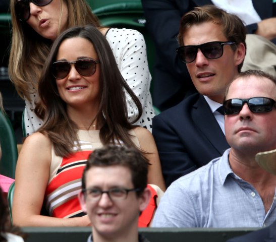 From left: Pippa Middleton and Nico Jackson watch the Gentlemen's Singles semi-final match of the Wimbledon Lawn Tennis Championships in London, on July 5, 2013.