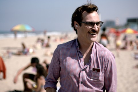 Joaquin Phoenix as Theodore in the romantic drama "HER," directed by Spike Jonze.
