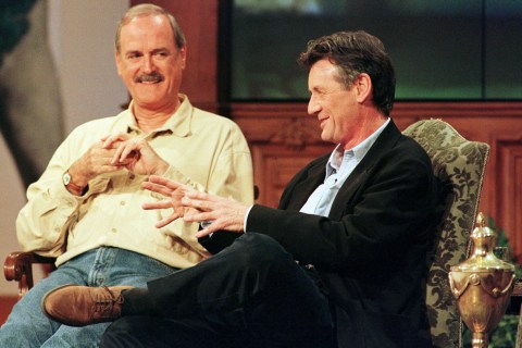Monty Python cast member John Cleese (L)and Michael Palin recount past moments from their television..
