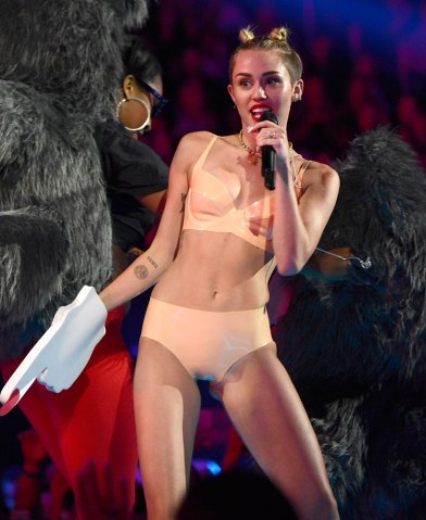 1. Miley Cyrus in nude latex bikini
