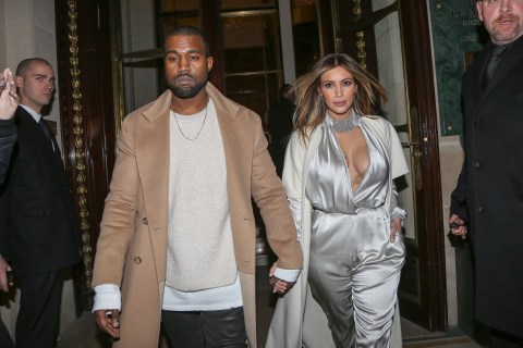 Kanye West and Kim Kardashian leave the 'Meurice' hotel on January 21, 2014 in Paris, France.  