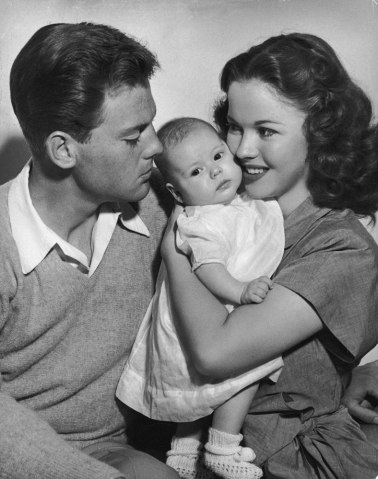 From left: John Agar and Shirley Temple with their three-month-old baby daughter, Linda Susan, in 1948.