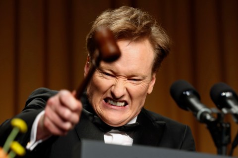 Comedian O'Brien smashes a gavel as he speaks during the White House Correspondents Association Dinner in Washington